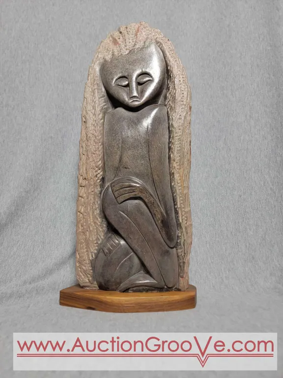 Shona Sculpture with Wooden Base. 18 x 8.5 x 4. A4