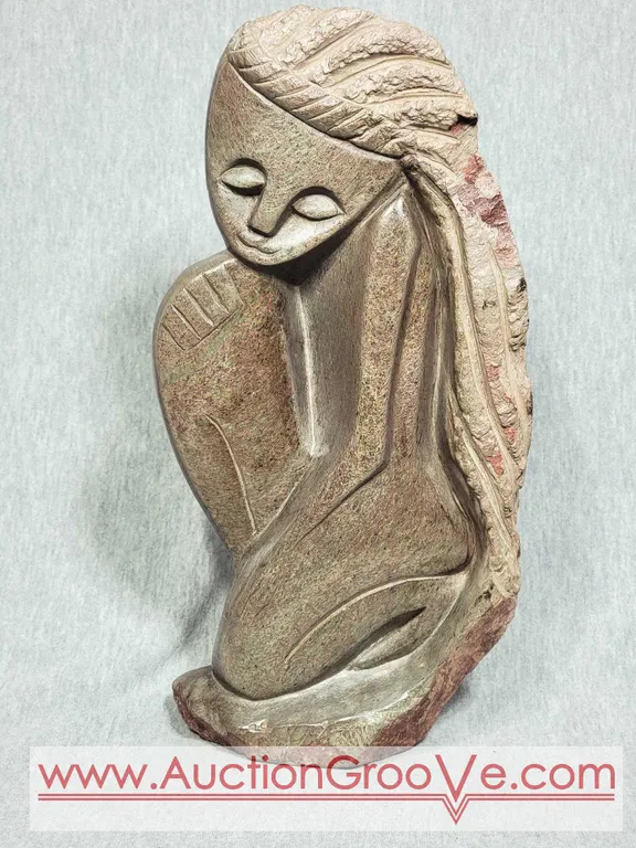 Shona Stone Carving if a Woman. 12 x 6 x 2. A2