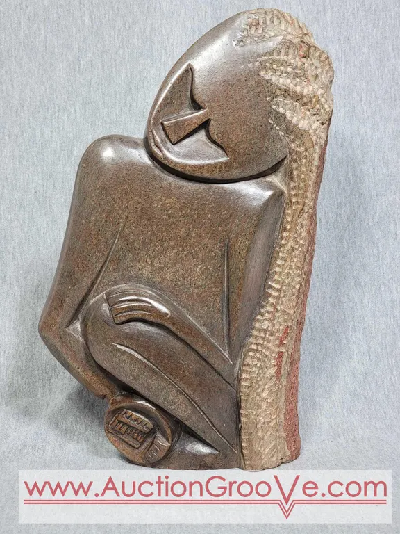 Shona Carving of a Woman. 12 x 7 x 2. A2