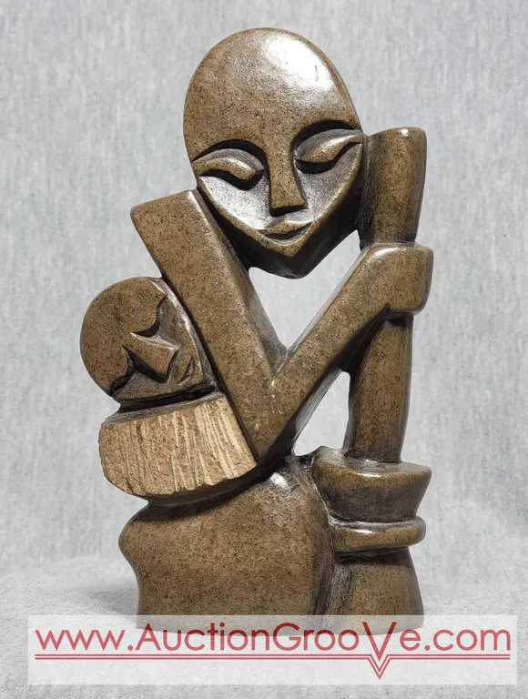 Shona Child on Mothers Back. 6.5 x 4.5 x 1.5. B3