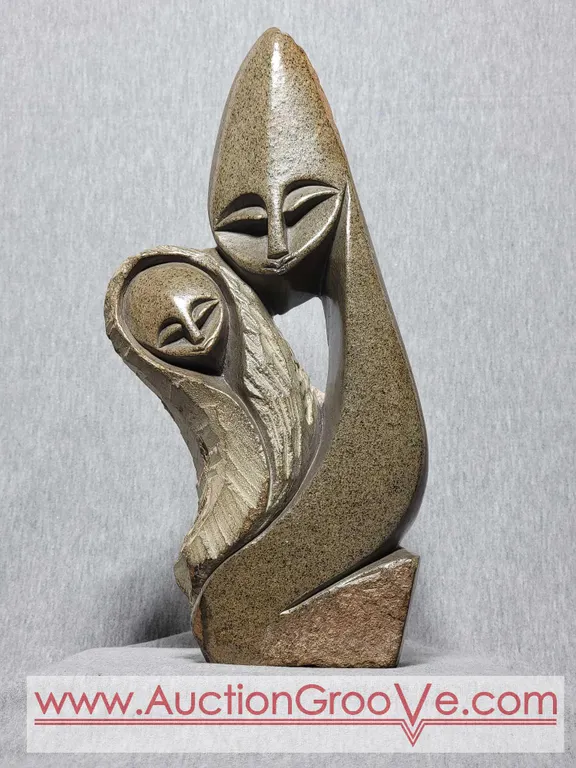Shona Man and Woman Statue. Signed by Artist Innocent Chifutu. 6 x 3 x 12.5. B3