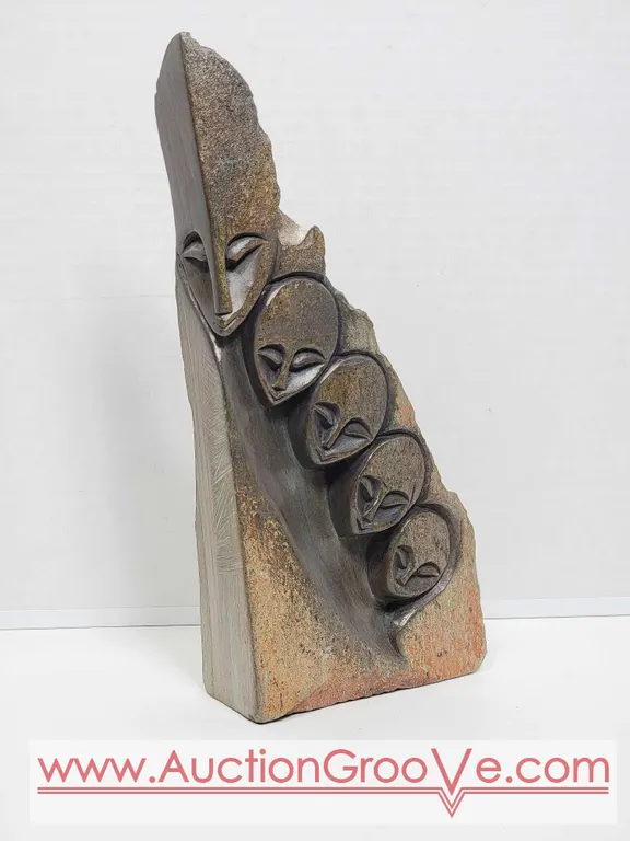 Shona Family of 5. Signed by Artist Innocent Chifutu. 12.5 x 5.5 x 2.5. F3