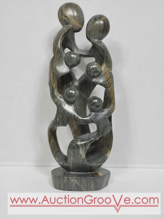Shona Family of 6. Hand Carved in Zimbabwe. Serpentine Stone. See photos. 16" x 5 x 3.5". D2.