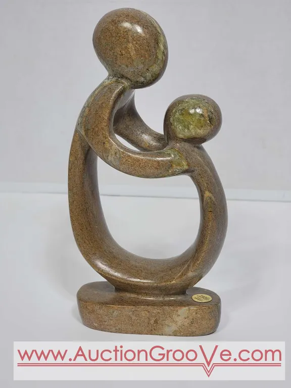 Shona Mother and Child. Hand Carved in Zimbabwe. Serpentine Stone. See photos. 7.5" x 3.5 x 1.5". D2.