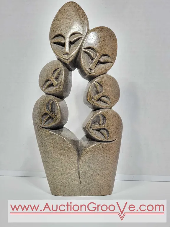 Shona Family of 6. Signed by Artist Innocent Chifutu. Hand Carved in Zimbabwe. Serpentine Stone. See photos. 12" x 6 x 2". D4.