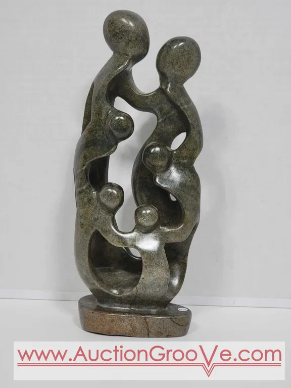 Shona Family of 6. Hand Carved in Zimbabwe. Serpentine Stone. See photos. 12.5" x 5 x 2.5". D4.