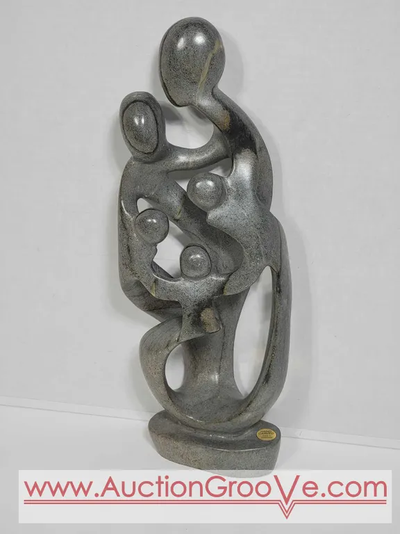 Shona Family of 5. Hand Carved in Zimbabwe. Serpentine Stone. See photos. 16.5" x 6 x 2.5". Est. $150 - $350. D5