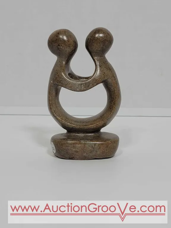 Shona Couple Statue. Hand Carved in Zimbabwe. See photos. 4" x 2.5 x 1.5".. D4