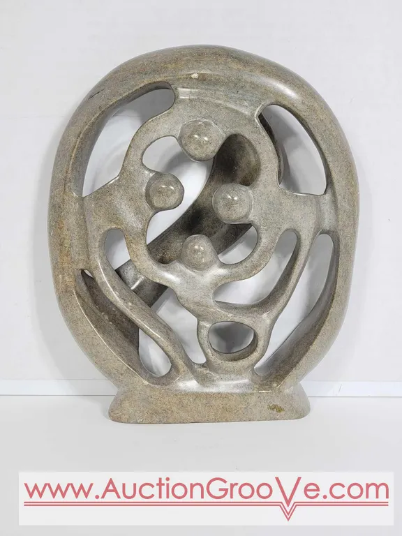 Shona Family of 4 Circle of Love. 9 x 7.5 x 1.5. D6
