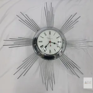 Vintage MCM Ingraham Chrome Electric Wall Clock . Measures 20" diameter . Working