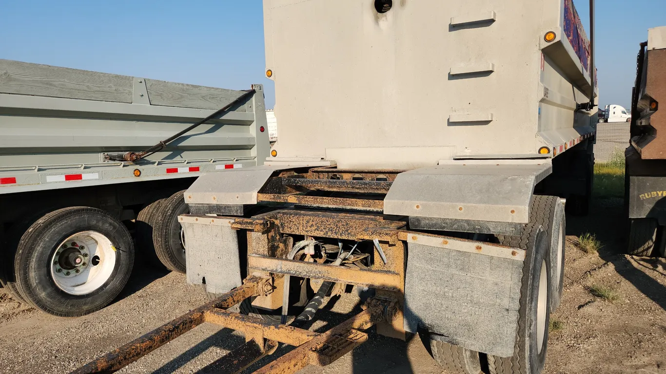 Lead . Quad End Dump