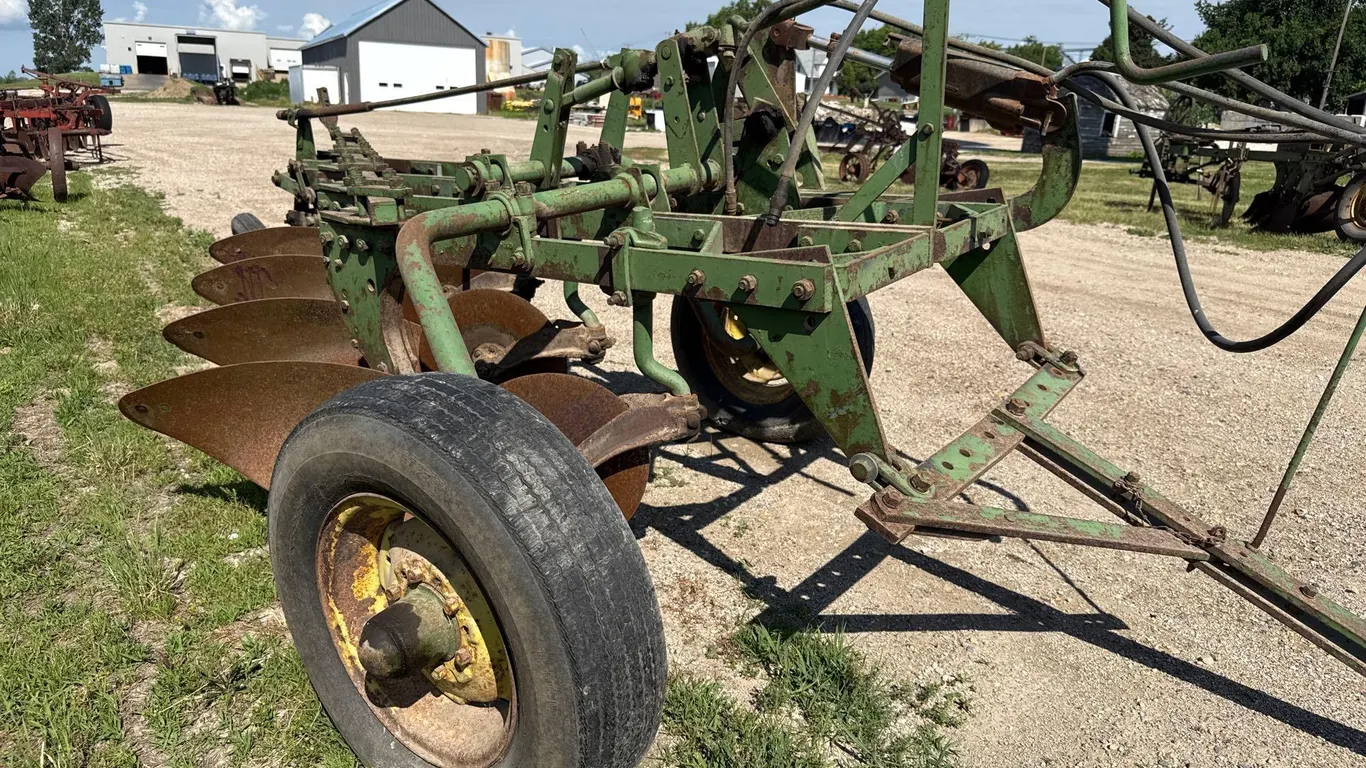 John Deere 7-77 4 bottom plow