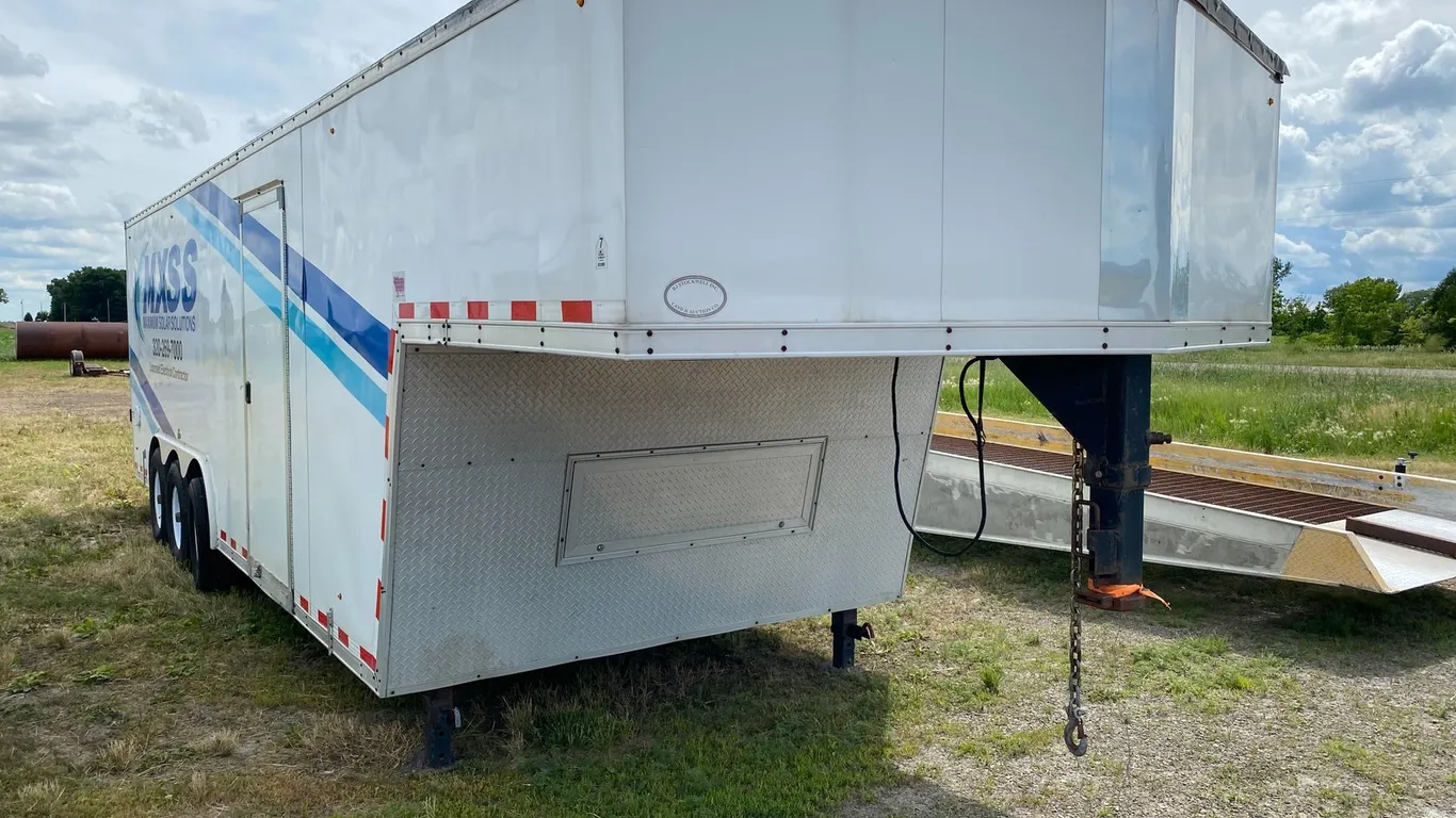 TRIPLE AXLE GOOSNECK ENCLOSED TRAILER