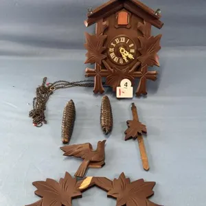 WOODEN CUCKOO CLOCK W/ WEIGHTS AND PENDULUM