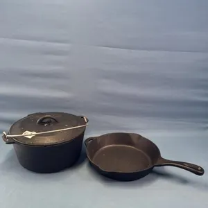10IN CAST IRON FRY PAN AND 10IN DUTCH OVEN