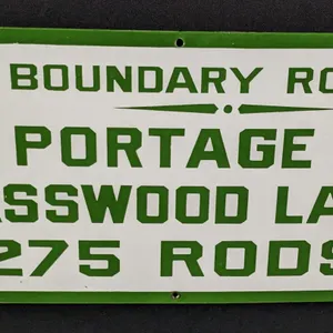 PORCELAIN SIGN US FOREST SERVICE BOUNDARY ROUTE PORTAGE TO BASSWOOD LAKE 275 RODS (ELY MINNESOTA AREA)