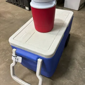 Coleman cooler and water bottle