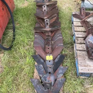 Assortment of used and new cultivator shovels