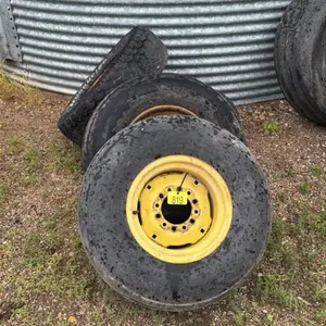 Assorted implement tires on steel rims