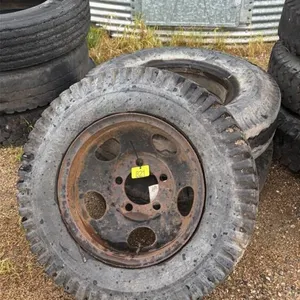 Assorted implement tires on steel rims