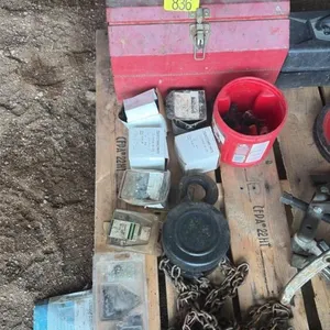Assorted haybine supplies/ and hoist