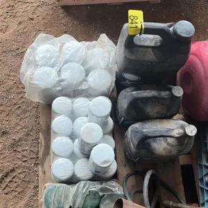 Large assortment of filters and 3 jugs of engine oil