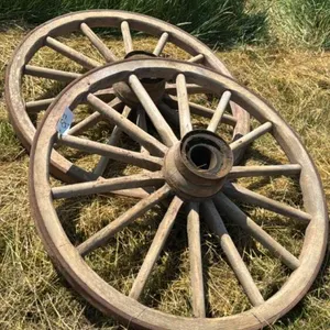 (2) 4FT AND WOODEN SPOKED WAGON WHEELS
