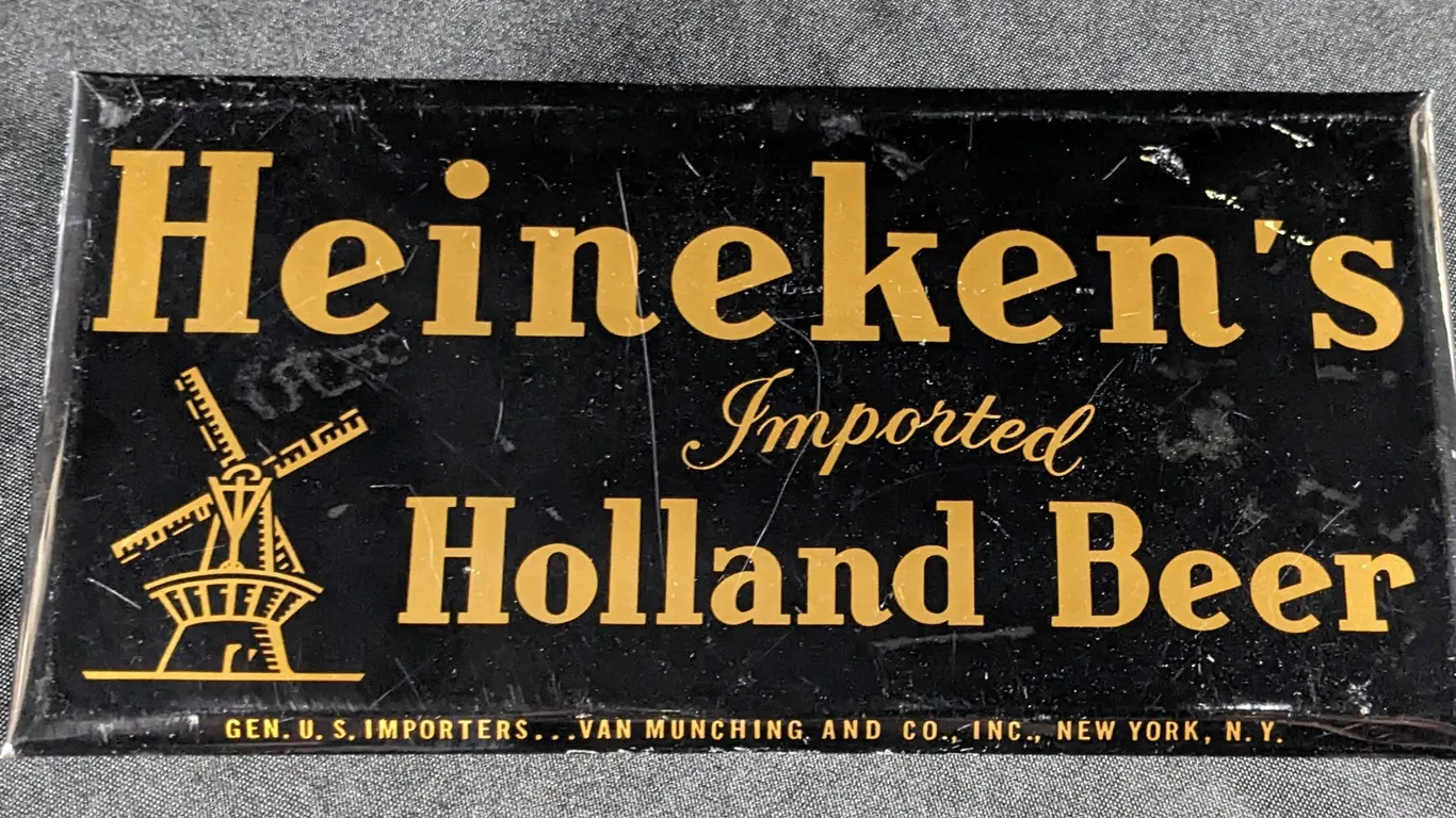 CELLULOID OVER TIN SIGN HEINEKEN'S IMPORTED HOLLAND BEER