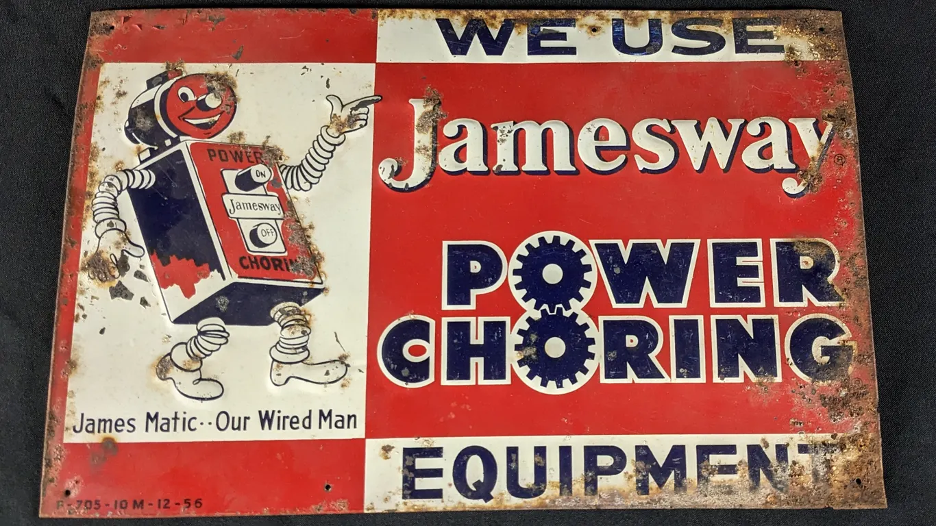 EMBOSSED TIN SIGN WE USE JAMESWAY POWER CHORING EQUIPMENT