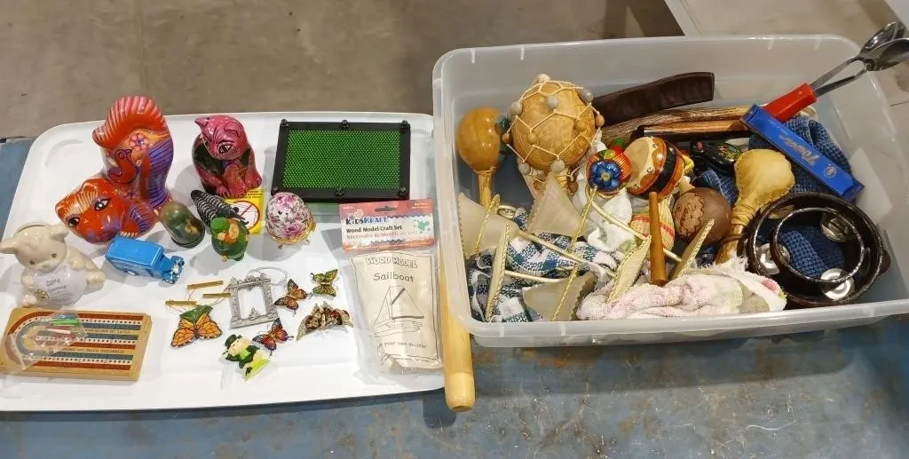 Tote wit assorted Maracas's, sppons, Hermonica,