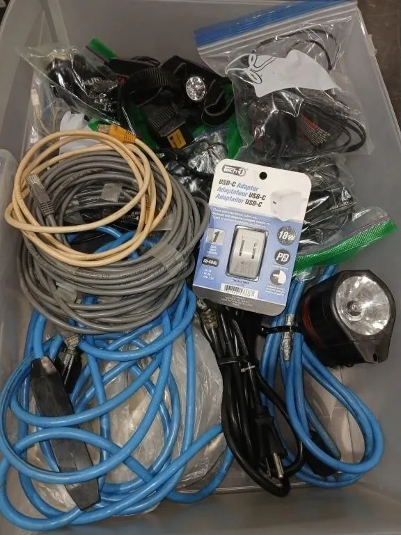 Bundle with assorted extension cords, cables,