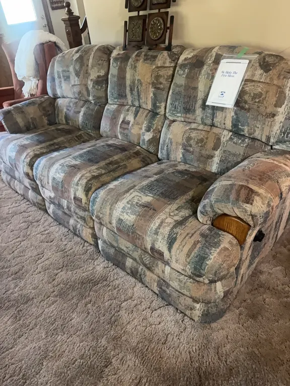 BERKLINE COUCH-RECLINES ON BOTH SIDES