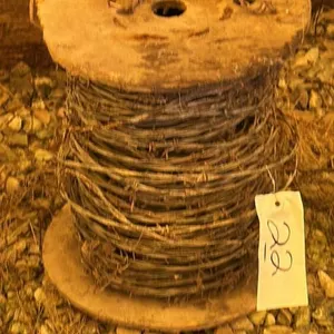PARTIAL ROLL OF BARB WIRE