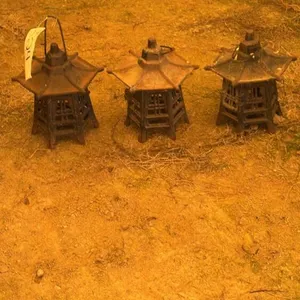 (3) CAST IRON CANDLE HOLDERS