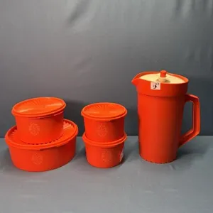 (4) STACKING TUPPERWARE CANISTERS W/ JUICE PITCHER