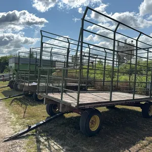 8’ x 16’ Bale Rack w/ Cage Sitting on MN “Rugged 8” Model 8078 Running Gear