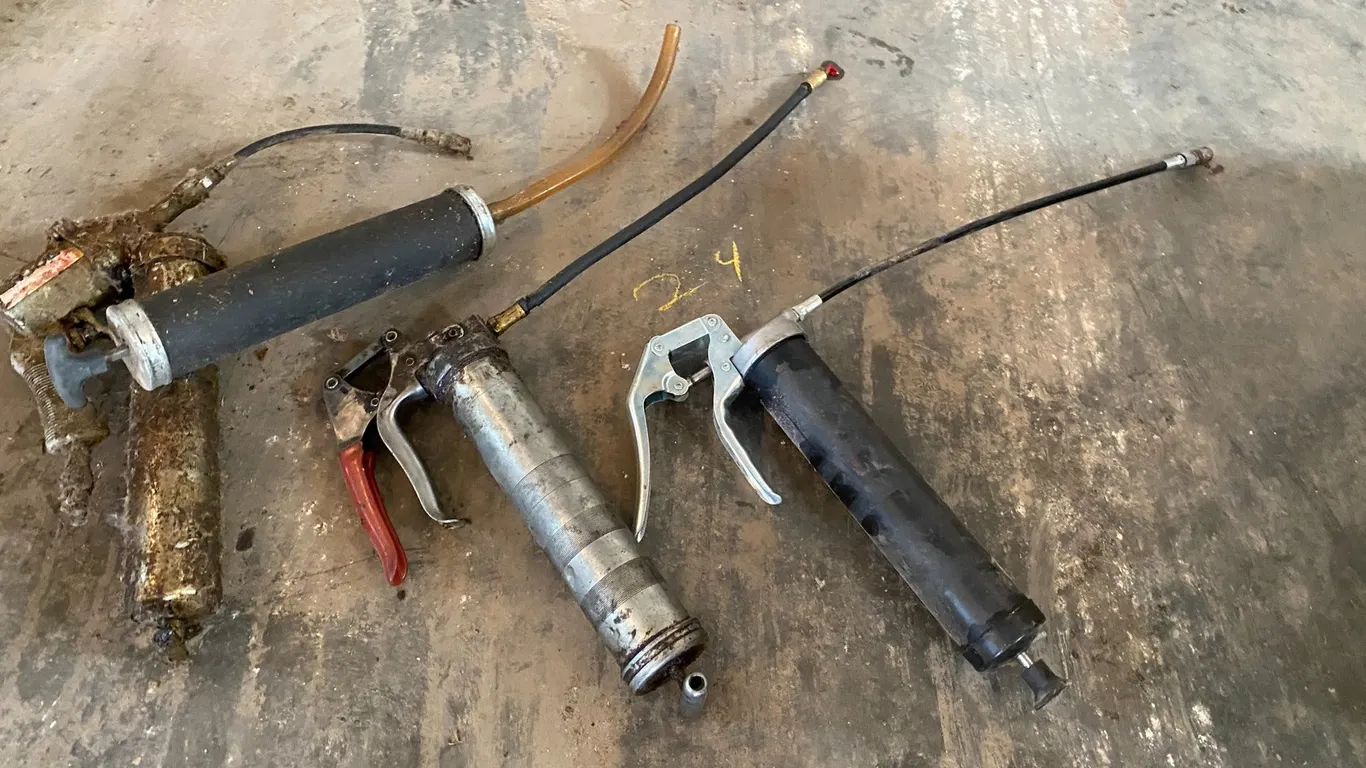 GREASE GUNS