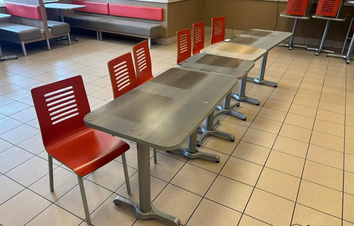 Restaurant Tables w/ Red Dining Chairs
UNRESERVED