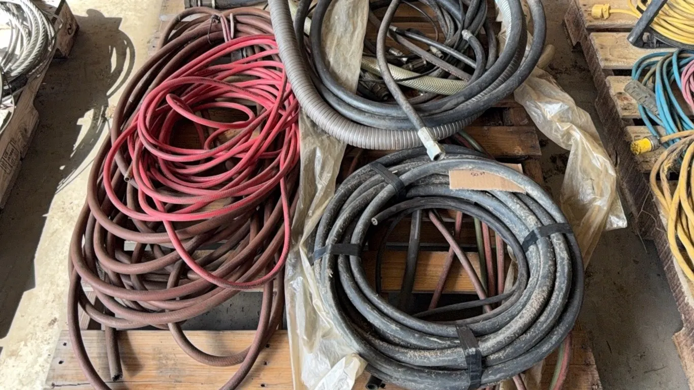 Large Quantity of Hoses of Varying Styles