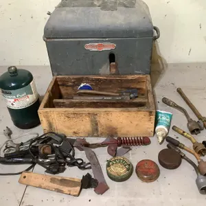 Watch Master metal box, 13 1/2" x 8" x 13" high, contents included, partial canister propane, torch ends, copper pcs, etc.