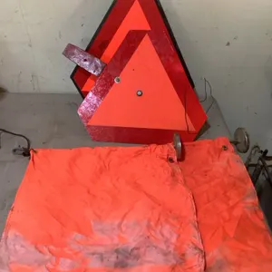 Slow moving vehicle signs, one metal, one plastic, magnetic wide load flags