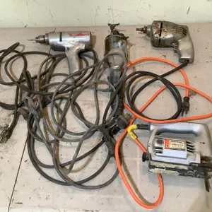 Drills, jigsaw, trouble light, all working