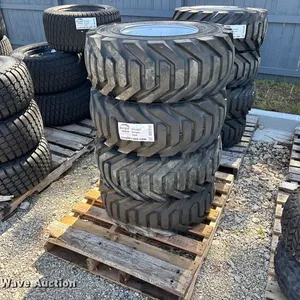 (4) 12-16.5 tires and wheels