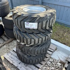 (4) 12-16.5 tires and wheels