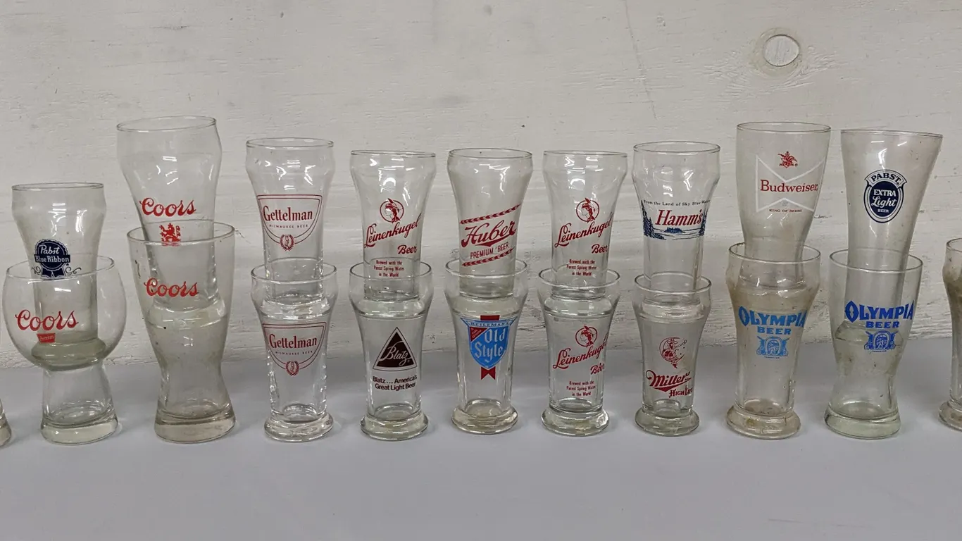 22 ASSORTED VINTAGE BEER GLASSES
