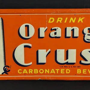 EMBOSSED TIN SIGN DRINK ORANGE CRUSH CARBONATED BEVERAGE