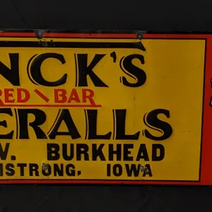 EMBOSSED TIN SIGN FINCK'S RED BAR OVERALLS ARMSTRONG IOWA
