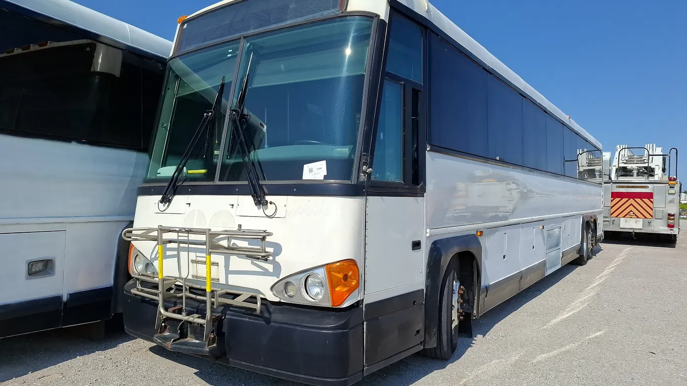 Non-Operable 2011 Motor Coach Industries D4500 T/A 55 Passenger Wheelchair Accessible Bus