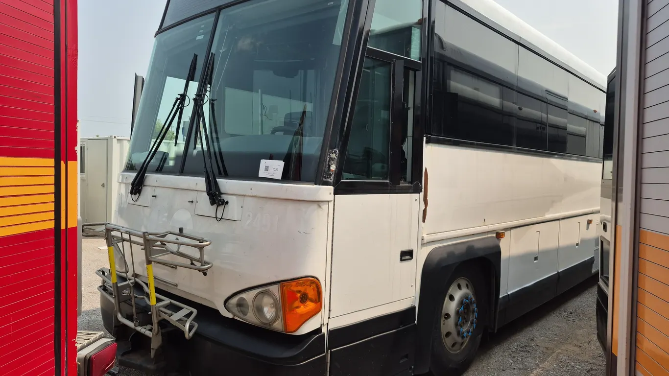 Non-Operable 2011 Motor Coach Industries D4500 T/A 55 Passenger Wheelchair Accessible Bus