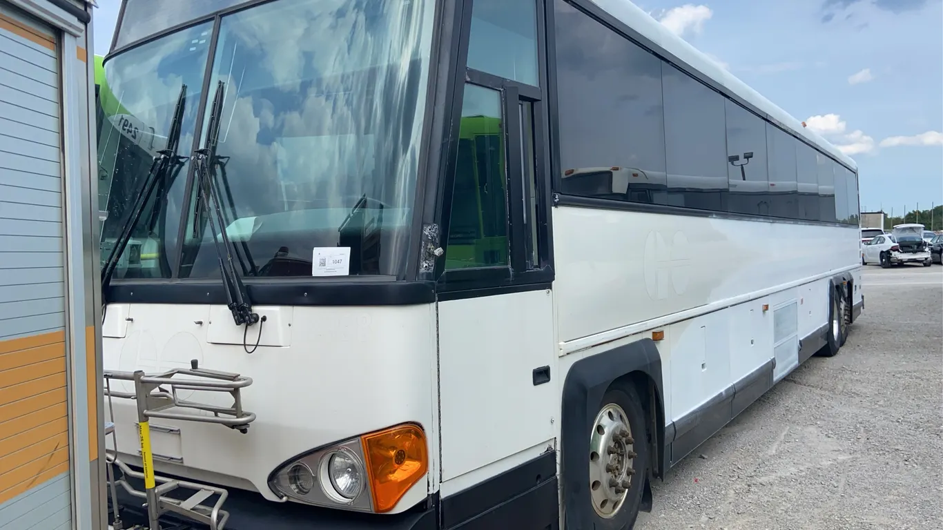 Non-Operable 2011 Motor Coach Industries D4500 55 Passenger Wheelchair Accessible Bus